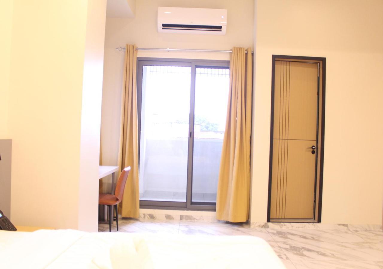 Ixoras Hotel Lemba Киншаса Экстерьер фото